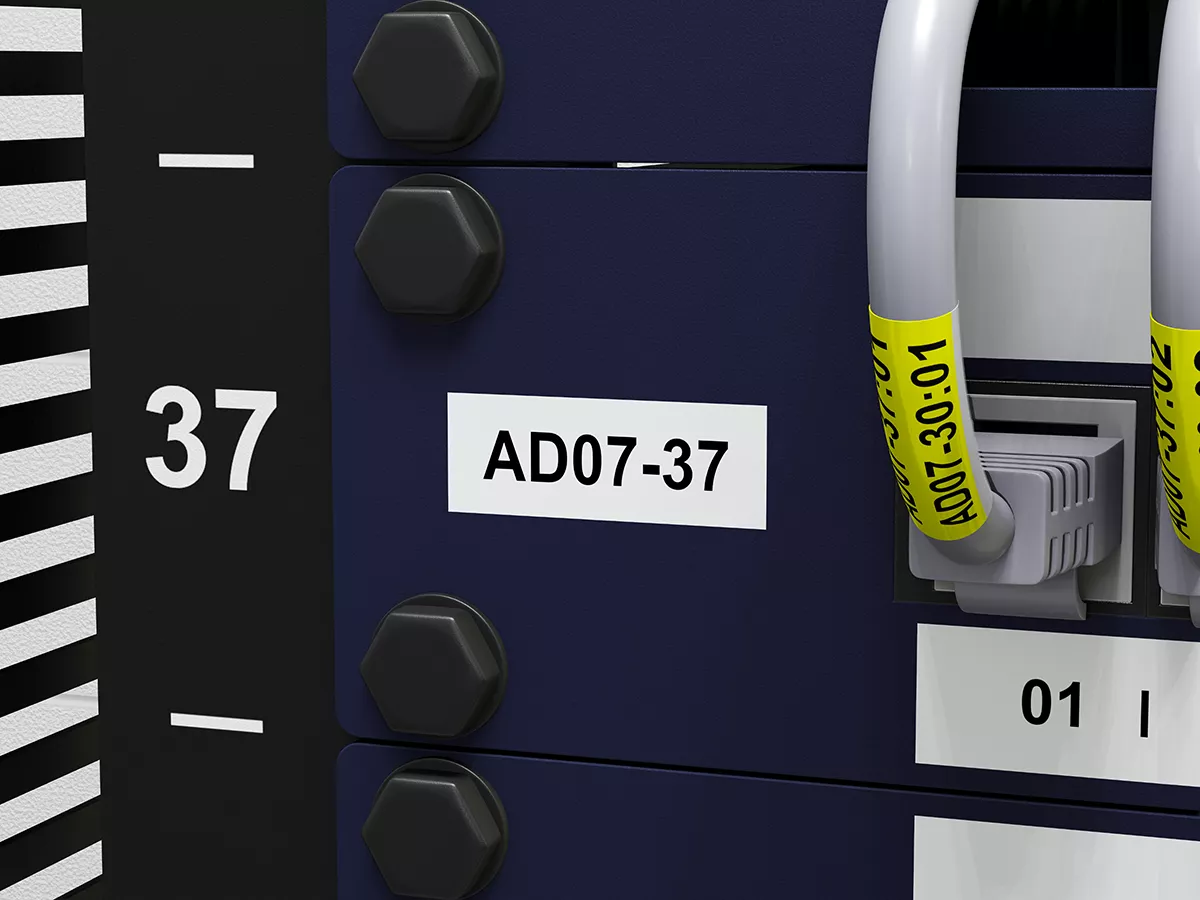 Network rack equipment identified with black on white strong adhesive label